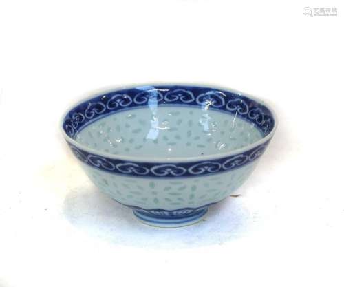 A Chinese rice grain porcelain bowl, Qianlong reign mark, wi...