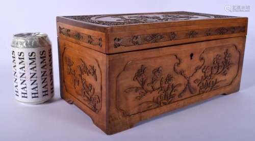 AN EARLY 20TH CENTURY CHINESE CARVED SANDALWOOD CASKET AND C...
