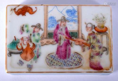A CHINESE QING DYNASTY FAMILLE ROSE PORCELAIN SCROLL WEIGHT ...
