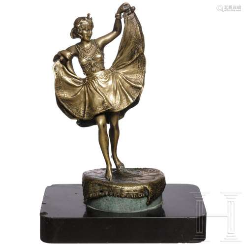 A small bronze sculpture of an amorous dancer, circa 1910/20