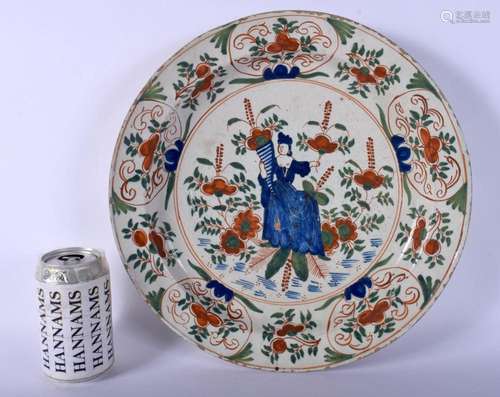 A LARGE 18TH CENTURY DELFT POLYCHROMED TIN GLAZED DISH paint...