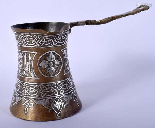 A 19TH CENTURY MIDDLE EASTERN SILVER INLAID HEATING BEAKER. ...