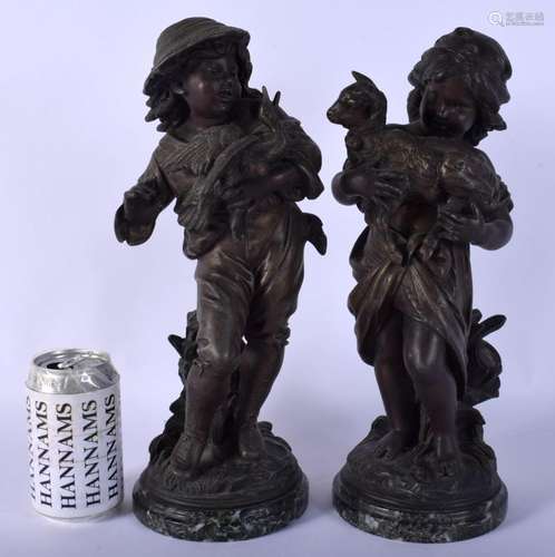 A PAIR OF 19TH CENTURY FRENCH SPELTER FIGURES OF A BOY AND G...