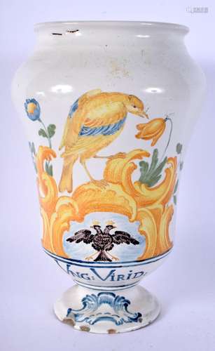 AN ANTIQUE ITALIAN FAIENCE TIN GLAZED DRUG JAR painted with ...