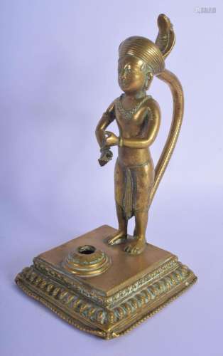 A CHARMING EARLY 19TH CENTURY INDIAN BRONZE FIGURE OF A BOY ...