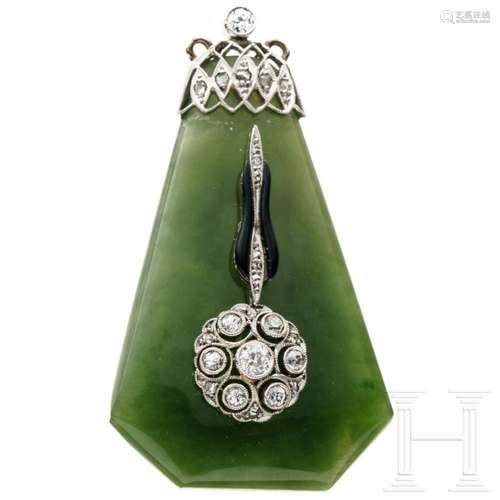 A nephrite and diamond pendant, circa 1920