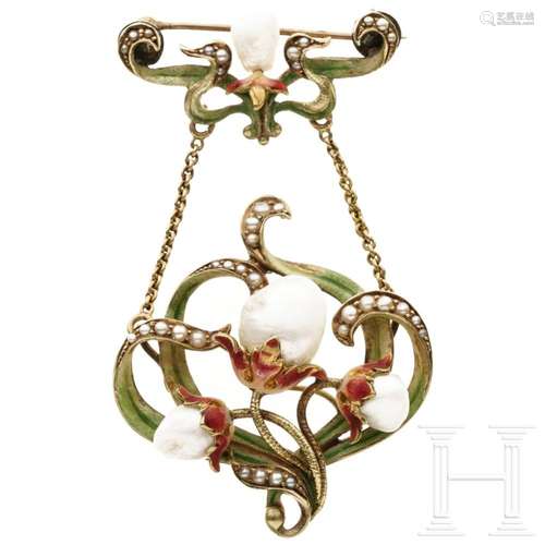 An Art Nouveau gold and pearl brooch, circa 1910