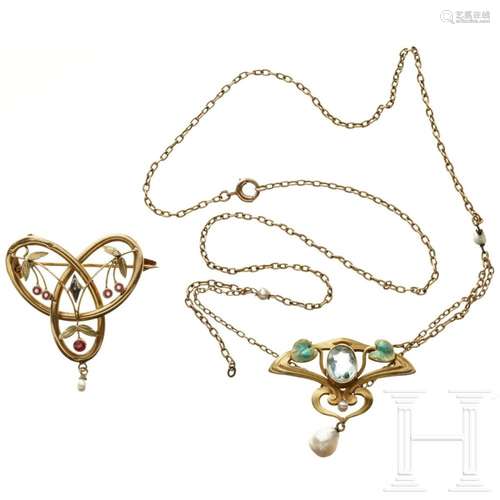 A gold art nouveau necklace with pendant and a brooch, circa...