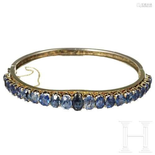 A gold and sapphire bracelet, circa 1920