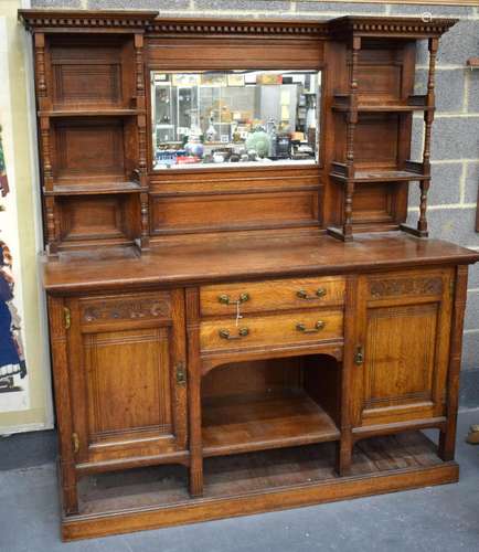 A VERY LARGE ARTS AND CRAFTS MIRROR BACK SIDEBOARD DISPLAY C...