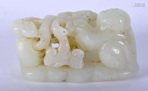 A CHINESE CARVED GREENISH WHITE JADE FIGURE OF A BOY 20th Ce...