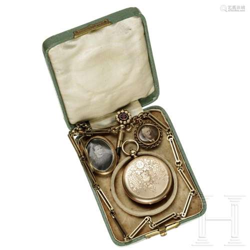 A gold savonette pocket watch with gilded pendant and medall...