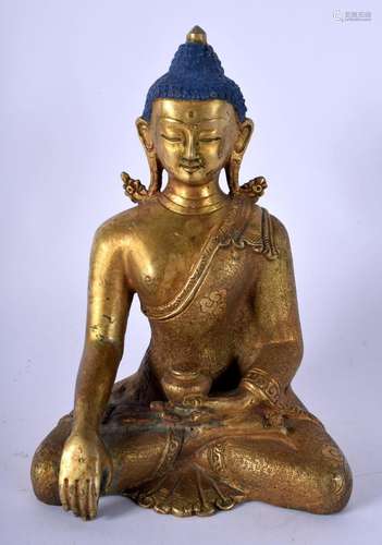 A 19TH CENTURY TIBETAN GILT BRONZE ALLOY METAL FIGURE OF A B...