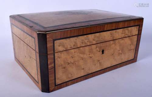 A 19TH CENTURY MIXED WALNUT DRESSING TABLE BOX with fitted i...