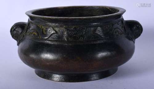 AN EARLY 20TH CENTURY CHINESE TWIN HANDLED BRONZE CENSER Lat...