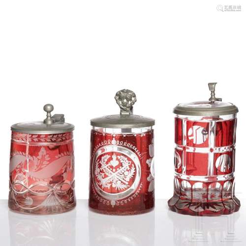 Three pewter-mounted, ruby-red glazed jugs, 19th century