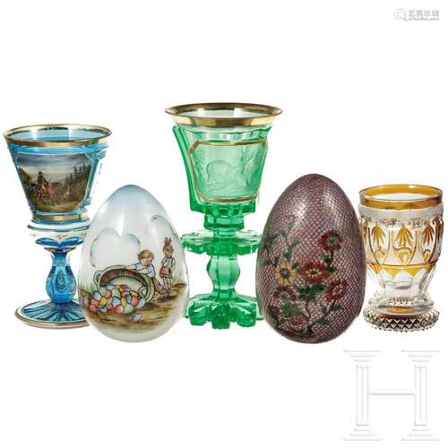 Three glass beakers and two glass eggs, circa 1900/20th cent...