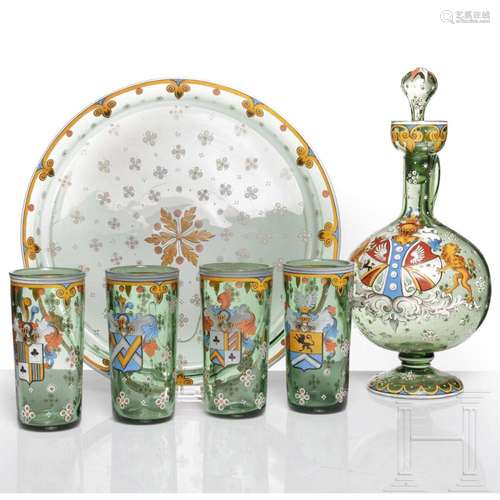 A Bohemian green glass six-piece drinking service, circa 188...