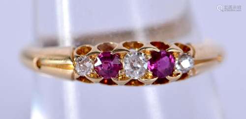 AN 18CT GOLD RUBY AND DIAMOND RING. N. 2.7 grams.