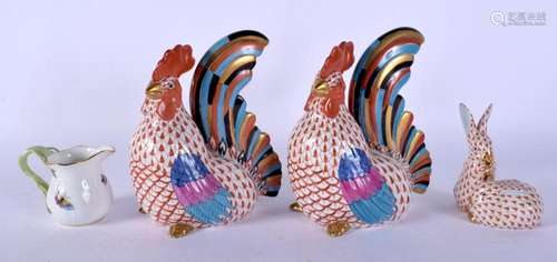 A PAIR OF HEREND PORCELAIN HENS together with a jug and rabb...