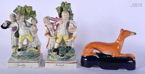 A RARE PAIR OF EARLY 19TH CENTURY PEARLWARE FIGHTING GROUPS ...