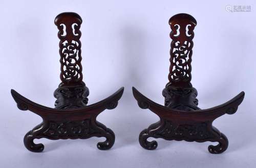 A PAIR OF EARLY 20TH CENTURY CHINESE HARDWOOD PLATE STANDS L...