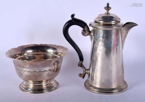 A VICTORIAN SILVER BOWL and a silver coffee pot. London 1869...