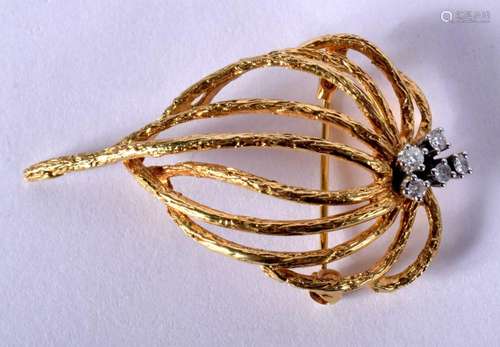 A 9CT GOLD AND DIAMOND BROOCH. 5.5 grams. 4.25 cm x 2.5 cm.