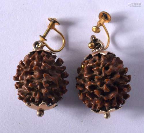 A PAIR OF ANTIQUE YELLOW METAL NUT EARRINGS. 8 grams. 4 cm x...