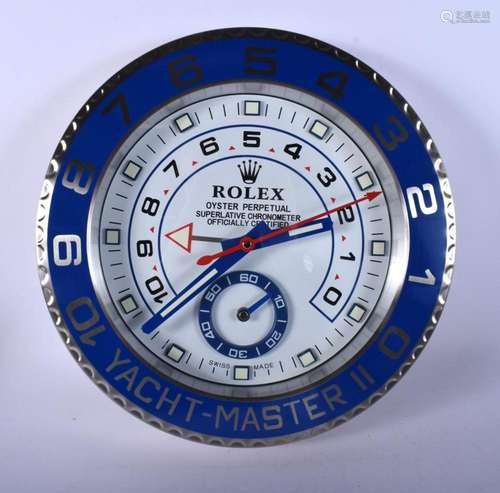 A ROLEX ADVERTISING DEALER DISPLAY HANGING WALL CLOCK. 30 cm...