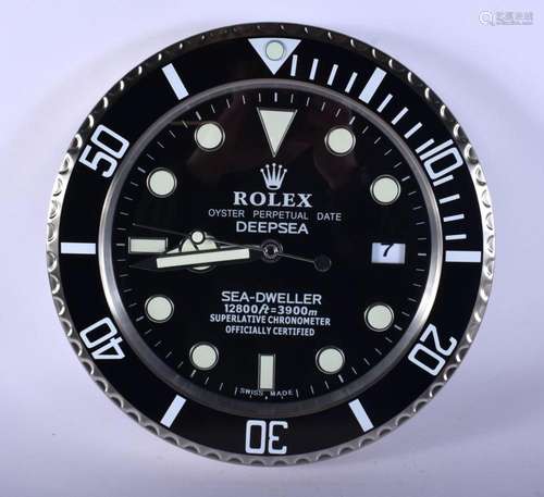 A ROLEX ADVERTISING DEALER DISPLAY HANGING WALL CLOCK. 30 cm...