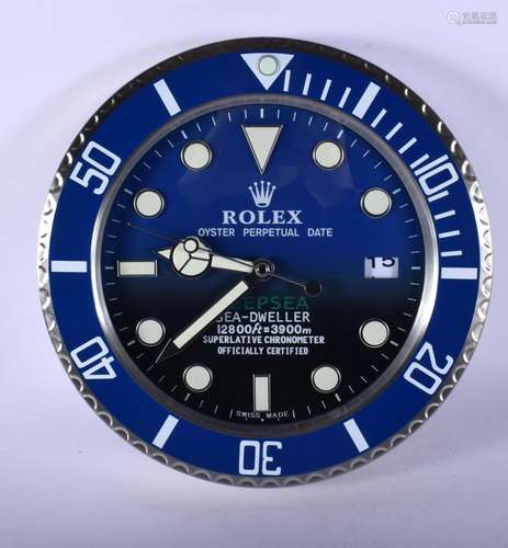 A ROLEX ADVERTISING DEALER DISPLAY HANGING WALL CLOCK. 30 cm...