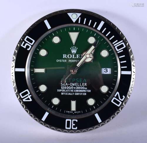 A ROLEX ADVERTISING DEALER DISPLAY HANGING WALL CLOCK. 30 cm...