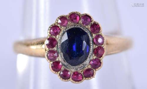 A FINE ANTIQUE 18CT GOLD SAPPHIRE AND RUBY RING. 3.5 grams. ...