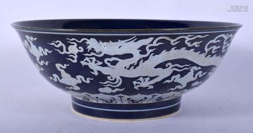 A CHINESE POWDER BLUE PORCELAIN BOWL 20th Century, painted w...