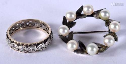 A WHITE METAL BROOCH and ring. 7.3 grams. Ring O. Largest 2....