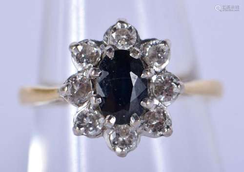 AN 18CT GOLD DIAMOND AND SAPPHIRE RING. M. 4 grams.