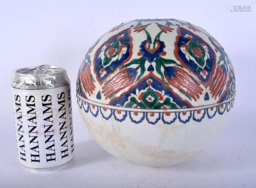 AN UNUSUAL OTTOMAN IZNIK MOSQUE HANGING BALL painted with fl...