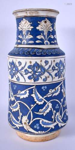 A TURKISH OTTOMAN BLUE AND WHITE FAIENCE IZNIK JAR painted w...