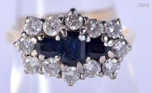 AN 18CT GOLD DIAMOND AND SAPPHIRE RING. N. 4.9 grams.