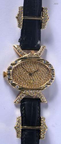 A DESIGNER 18CT GOLD AND DIAMOND LADIES COCKTAIL WATCH with ...