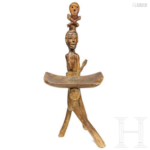 A Central African carved wooden stool, 29th century