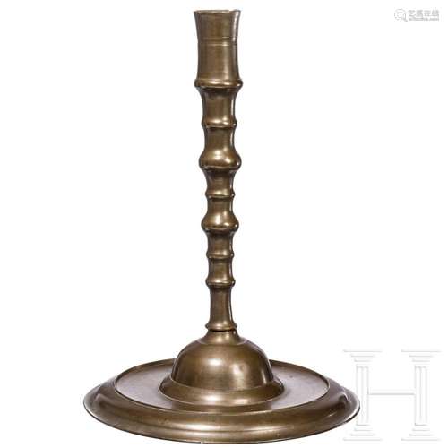 A large Ottoman bronze candlestick, 18th century