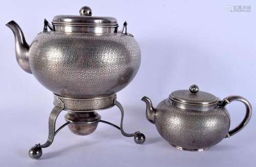 TWO 19TH CENTURY CONTINENTAL JAPANESE STYLE WHITE METAL TEAP...