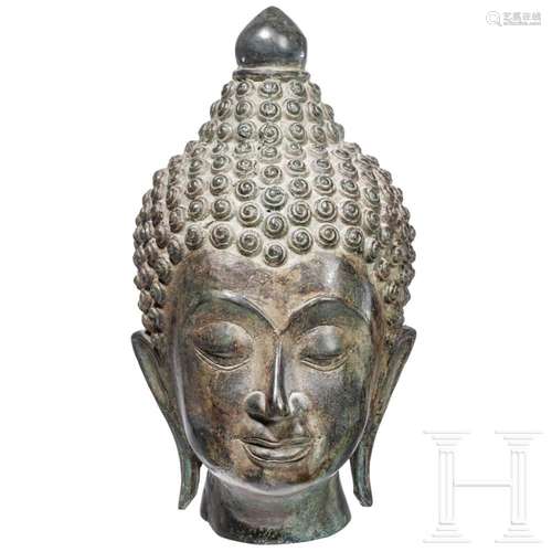 A Cambodian bronze Buddha head in Khmer style, circa 1900