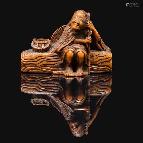 NETSUKE en buis, représentant la poétesse Ono-no-Komachi, di...