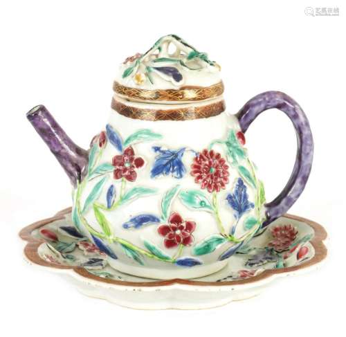A 19TH CENTURY CHINESE HIGH RELIEF FAMILLE ROSE TEAPOT AND C...