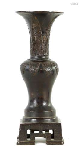 AN EARLY CHINESE PATINATED BRONZE VASE