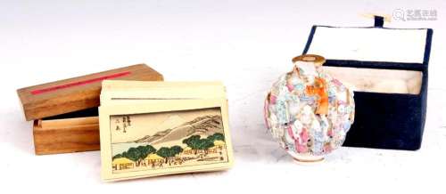 A 19TH CENTURY CHINESE OVOID SNUFF BOTTLE AND A BOXED SET OF...