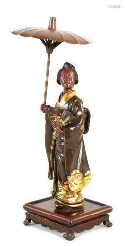 A JAPANESE MIEJI PERIOD BRONZE AND GILT SCULPTURE BY GYOKO